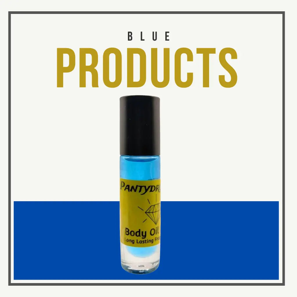 A bottle of “Pantydrip Body Oil” with blue liquid and a yellow label stands centered on a two-tone background—white on top, blue on bottom. Bold gold text above reads “BLUE PRODUCTS,” emphasizing cool, confident fragrance energy