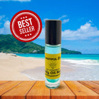Beautiful Day body oil fragrance by Body Oil Nupe. Light blue scent inside of glass bottle sitting at beach with wood table background. Best Seller label for long-lasting body oil scent. 