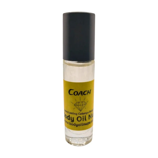 A clear bottle with a black cap labeled 'Coach' containing amber body oil. Long-lasting fragrance from Body Oil Nupe