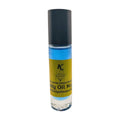 A dark blue bottle of body oil with a black cap and a label with the text 'K by Body Oil Nupe'. Long-lasting fragrance from Body Oil Nupe