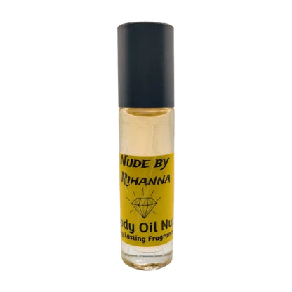 A clear glass bottle with a black cap containing yellow liquid, labeled 'Nude by Rihanna Body Oil Nupe: Celebrate Your Individuality with Elegance'. Yellow clear scent inside of glass bottle