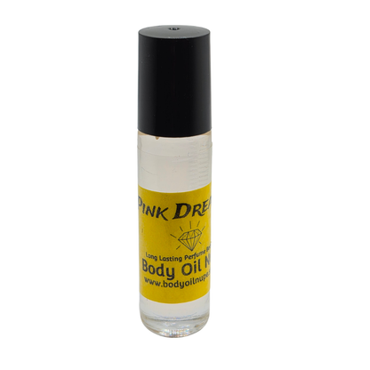 Pink Dreams Body Oil by Body Oil Nupe, roll-on bottle of body oil with a black cap and yellow label on a white background, clear fragrance oil, long-lasting tropical fruity scent 