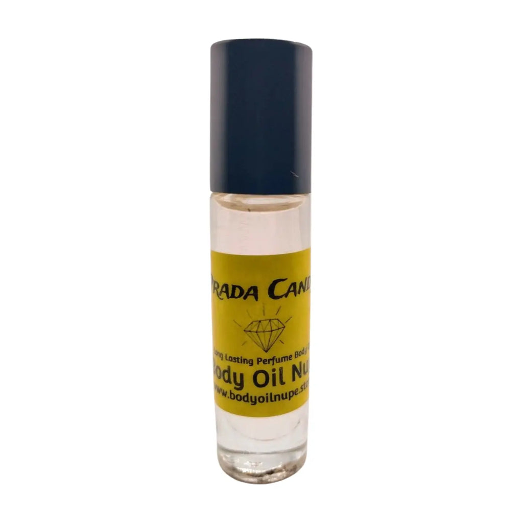 A bottle of Prada Candy Women's Fragrance Body Oil with a clear liquid visible inside, sealed with a black cap and labeled with the product name and brand.