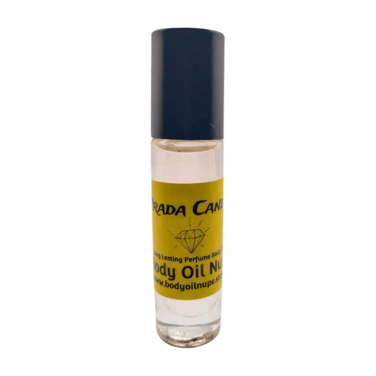 A bottle of Prada Candy Women's Fragrance Body Oil with a clear liquid visible inside, sealed with a black cap and labeled with the product name and brand.