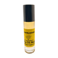 A clear bottle with a black cap labeled 'Sandalwood' which contains a unisex body oil by Body Oil Nupe.