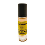 A small, clear bottle with a black cap labeled 'SCANDALOUS by Body Oil Nupe', indicating a fragrant body oil. Long-lasting fragrance from Body Oil Nupe