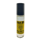 A clear bottle containing a blue liquid with a black cap, labeled 'ULTRA BLUE Body Oil Nupe', presented against a white background. Clear Blue fragrance inside of clear roll-on glass bottle with black cap