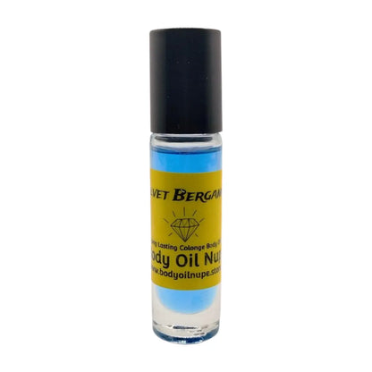 A bottle of Velvet Bergamot body oil by Body Oil Nupe with a dark blue liquid visible through the clear glass and a black cap. Long-lasting body oil fragrances 