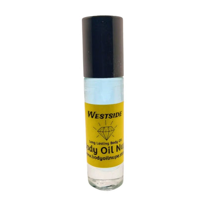 A clear bottle containing a soft blue liquid with a black cap, labeled 'Westside Body Oil Nupe'. Long-lasting light blue body oil fragrance. 
