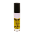 A clear roller bottle with yellow liquid inside, labeled 'Wet P♥ Body Oil Nupe: Sensuality Redefined in Every Roll', with a black cap. Long-lasting body oil fragrance