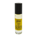 Roll-on bottle of Yara body oil with a black cap on a white background in glass bottle roll-on bottle